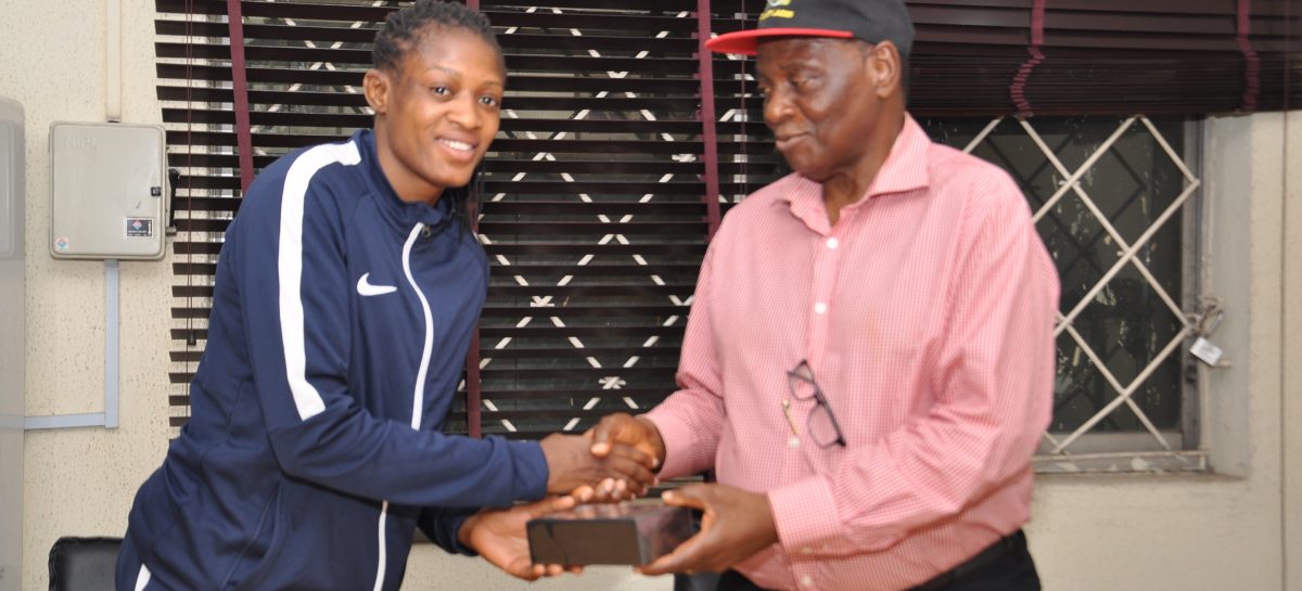 NOC PRESENTS GIFT TO OLYMPIAN