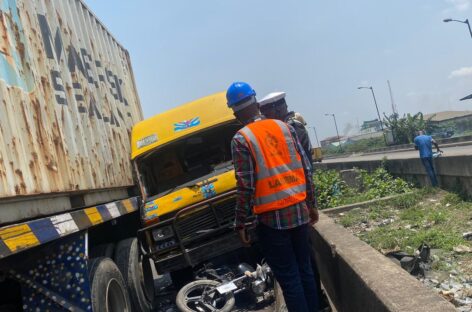 One feared dead, motorcyclist Injured as container crush bus, bike in Lagos