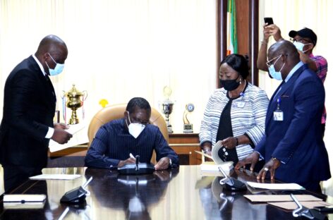 Okowa signs violence against persons, local content Bills
