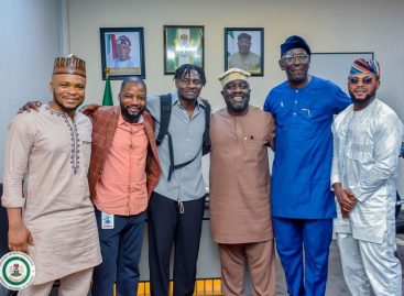 NSC DG, Olopade Receives Obafemi Martins, Urges Young Players to Emulate His Patriotism