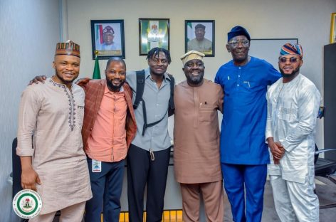 NSC DG, Olopade Receives Obafemi Martins, Urges Young Players to Emulate His Patriotism